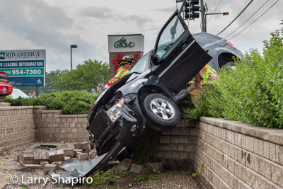 two people were trapped after a two car crahs in Buffalo Grove IL 6/7/15 on McHenry Road near Lake Cook Road shapirophotography.net Larry Shapiro photographer extrication